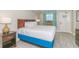 Bedroom with bed, nightstand, and balcony view at 2207 S Ocean Blvd. # 915, Myrtle Beach, SC 29577
