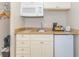Small kitchen with microwave, sink, and mini-fridge at 2207 S Ocean Blvd. # 1105, Myrtle Beach, SC 29577
