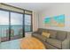 Living room with ocean view, sofa, coffee table, and balcony access at 2207 S Ocean Blvd. # 1105, Myrtle Beach, SC 29577