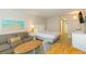 Bedroom with double bed, sofa, and dining table at 2207 S Ocean Blvd. # 1105, Myrtle Beach, SC 29577
