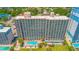 Aerial view of building, pool, and landscaping at 2207 S Ocean Blvd. # 1401, Myrtle Beach, SC 29577