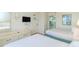 Two double beds, dresser, and a view of kitchenette at 2207 S Ocean Blvd. # 1401, Myrtle Beach, SC 29577