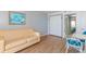 Living room with dining area and bedroom access at 2207 S Ocean Blvd. # 1401, Myrtle Beach, SC 29577