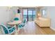 Living room with ocean view and balcony access at 2207 S Ocean Blvd. # 1401, Myrtle Beach, SC 29577