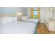 Bedroom with two double beds, nightstands, and an ocean view at 2207 S Ocean Blvd. # 1401, Myrtle Beach, SC 29577