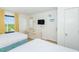 Bedroom with two double beds, dresser, and an ocean view at 2207 S Ocean Blvd. # 1401, Myrtle Beach, SC 29577