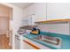 Small kitchen with microwave, stove, and refrigerator at 2207 S Ocean Blvd. # 1401, Myrtle Beach, SC 29577