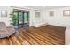 Living room with comfy seating, sliding doors to screened porch at 775 Plantation Dr. # 88, Little River, SC 29566