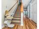 Staircase with installed stairlift for accessibility at 775 Plantation Dr. # 88, Little River, SC 29566