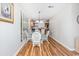 Dining area with glass table and view into kitchen at 775 Plantation Dr. # 88, Little River, SC 29566