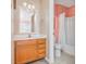 Clean bathroom with wooden vanity and shower at 775 Plantation Dr. # 88, Little River, SC 29566