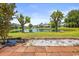 View of a pond and community from a patio at 775 Plantation Dr. # 88, Little River, SC 29566