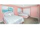 Spacious bedroom with two twin beds and closet at 775 Plantation Dr. # 88, Little River, SC 29566