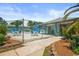 Community pool area with tables and chairs at 775 Plantation Dr. # 88, Little River, SC 29566