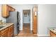 Kitchen with granite countertops and stainless steel fridge at 775 Plantation Dr. # 88, Little River, SC 29566