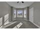Well-lit bedroom with carpet, large windows, and plenty of natural light at 4874 Luster Leaf Circle # 304, Myrtle Beach, SC 29577