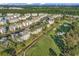 Aerial view of community with buildings, golf course, and ocean at 4874 Luster Leaf Circle # 304, Myrtle Beach, SC 29577