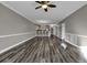 Bright living room with hardwood floors and ceiling fan at 4874 Luster Leaf Circle # 304, Myrtle Beach, SC 29577