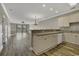 Open kitchen with light cabinets, breakfast bar, and modern appliances at 4874 Luster Leaf Circle # 304, Myrtle Beach, SC 29577