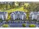 Aerial view of condo building and surrounding golf course at 4874 Luster Leaf Circle # 304, Myrtle Beach, SC 29577