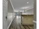 Bright entryway with hardwood floors and views to the living room and kitchen at 4874 Luster Leaf Circle # 304, Myrtle Beach, SC 29577