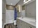 Double vanity bathroom with a shower/tub combo and mosaic tile at 4874 Luster Leaf Circle # 304, Myrtle Beach, SC 29577