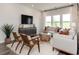 Relaxing living room with a cozy sofa and large TV at 4133 Bayhill St., Myrtle Beach, SC 29579