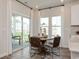 Bright breakfast nook features a round table and chairs, perfect for enjoying morning meals at 4133 Bayhill St., Myrtle Beach, SC 29579