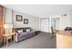 Living room with sofa, end table, and desk at 1501 S Ocean Blvd. # 646, Myrtle Beach, SC 29577