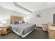 King-size bed, TV, and comfortable seating in this bedroom at 1501 S Ocean Blvd. # 646, Myrtle Beach, SC 29577