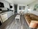 Living area with sofa, dining table, and kitchenette at 5308 N Ocean Blvd. # 1804, Myrtle Beach, SC 29577