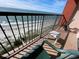 Balcony view of the ocean and beach with chairs at 5308 N Ocean Blvd. # 1804, Myrtle Beach, SC 29577
