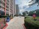 Resort-style pool area with brick walkways and lush landscaping at 5308 N Ocean Blvd. # 1804, Myrtle Beach, SC 29577