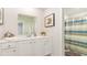 Clean bathroom with a vanity, shower, and striped shower curtain at 538 Goldstar St., Conway, SC 29526