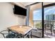Small dining area with ocean view, perfect for enjoying meals at 6900 N Ocean Blvd. # 910, Myrtle Beach, SC 29572