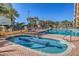 Resort-style pool and ' pool with lounge chairs at 6900 N Ocean Blvd. # 910, Myrtle Beach, SC 29572