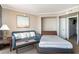 Bedroom with sofa bed and access to the bathroom at 6900 N Ocean Blvd. # 910, Myrtle Beach, SC 29572
