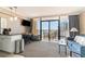 Living area featuring ocean view and sliding glass doors at 6900 N Ocean Blvd. # 910, Myrtle Beach, SC 29572