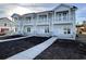 New townhouses with gray siding, stone accents, and balconies at 780 Maxine Ct. # 8A, Myrtle Beach, SC 29577