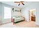 Cozy bedroom with daybed, en-suite bathroom access, and beach decor at 1342 Saw Palmetto St., North Myrtle Beach, SC 29582