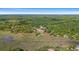 Aerial view of Marsh Pointe neighborhood near water at 16 Mullet Bay Rd, Pawleys Island, SC 29585