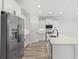 Modern kitchen with stainless steel appliances and white shaker cabinets at 16 Mullet Bay Rd, Pawleys Island, SC 29585