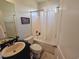 Clean bathroom with a tub, shower, and updated fixtures at 5226 Highway 17 Business, Murrells Inlet, SC 29576