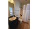 Clean bathroom with tub shower, vanity, and toilet at 5226 Highway 17 Business, Murrells Inlet, SC 29576