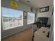 Bonus room features large windows, TV, and workspace at 5226 Highway 17 Business, Murrells Inlet, SC 29576