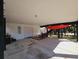 Covered carport with seating area and kayak storage at 5226 Highway 17 Business, Murrells Inlet, SC 29576