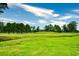 Serene golf course landscape with lush greenery at 4789 Wild Iris Dr. # 203, Myrtle Beach, SC 29577