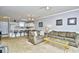 Open concept kitchen and living area, breakfast bar, and neutral color palette at 4789 Wild Iris Dr. # 203, Myrtle Beach, SC 29577