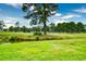 Peaceful golf course view with a pond and lush green grass at 4789 Wild Iris Dr. # 203, Myrtle Beach, SC 29577