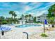 Community pool and patio area with comfortable seating at 4789 Wild Iris Dr. # 203, Myrtle Beach, SC 29577